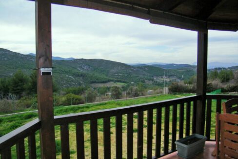 Verandas overlooking the garden, trees and mountains