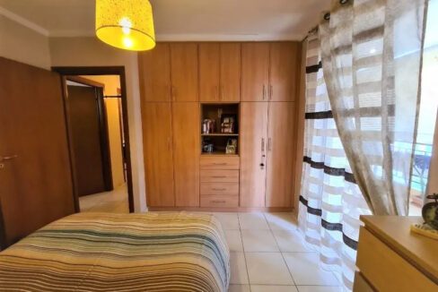 large wardrobes in the bedroom apartment in Patras