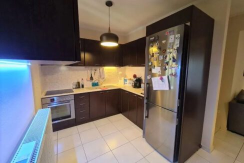 Fully furnished apartment kitchen in Patras